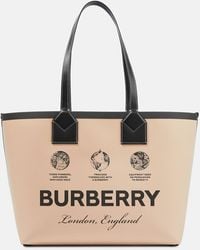 Burberry - Borsa tote London piccola in pelle e cotone con stampa stile etichetta - Lyst