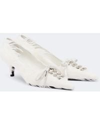 Prada - Feather-Trimmed Satin Pumps - Lyst