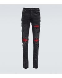 Amiri Skinny Jeans MX1 Distressed - Blau