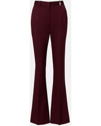 Versace - Wool Flared Pants - Lyst