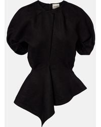 KHAITE - Rumi Peplum Linen-Blend Top - Lyst