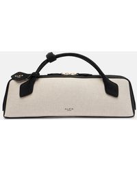 Alaïa - Le Teckel Canvas Clutch - Lyst