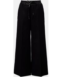 Alaïa - Leather-Trimmed Virgin Wool Wide-Leg Pants - Lyst