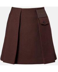 Loewe - Leather-Trimmed Pleated Wool And Silk Miniskirt - Lyst