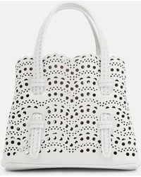 Alaïa - Mina Mini Leather Crossbody Bag - Lyst