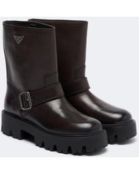 Prada - Stride Leather Biker Boots - Lyst
