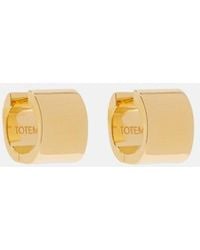 TOTEME - Signature Petite Huggie Earrings - Lyst