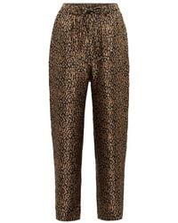 Nanushka - Pantalones de seda estampados - Lyst