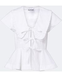Ganni - Bow-Detail Peplum Cotton Poplin Blouse - Lyst