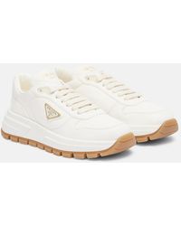 Prada - Leather Triangle Sneakers - Lyst