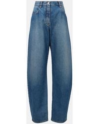 Alaïa - High-Rise Barrel-Leg Jeans - Lyst