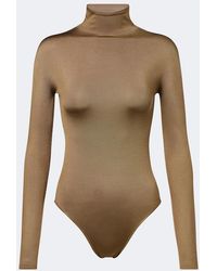 Alaïa - Turtleneck Silk-Blend Bodysuit - Lyst