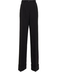 Pantalon Synthétique Dolce & Gabbana en coloris Noir Femme Vêtements Pantalons décontractés élégants et chinos Pantalons moulants 