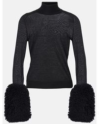 Alaïa - Faux Fur-Trimmed Wool Turtleneck Top - Lyst