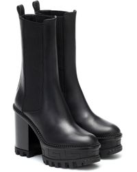 Versace Ankle Boots aus Leder - Schwarz