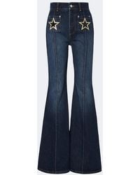 Dolce & Gabbana - Jeans Flared Con Parches - Lyst