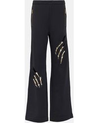 Area - Claw Embellished Cutout Sweatpants - Lyst