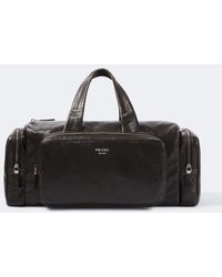 Prada - Distressed Leather Duffel Bag - Lyst