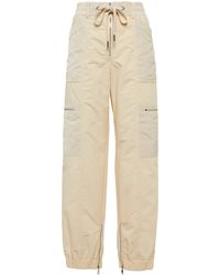 Cropped trousers di Moncler in Neutro Donna Abbigliamento da Giacche 