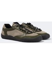 Prada - Speedrock Leather-Trimmed Sneakers - Lyst