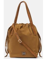 KHAITE - Rory Medium Leather-Trimmed Bucket Bag - Lyst