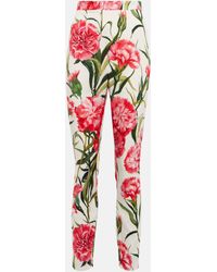 Dolce & Gabbana - Pantalon slim en soie melangee a fleurs - Lyst