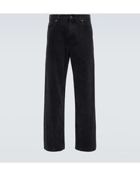 Dolce & Gabbana - Jeans a gamba larga con logo - Lyst