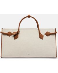 Alaïa - Le Teckel Leather-Trimmed Canvas Tote Bag - Lyst