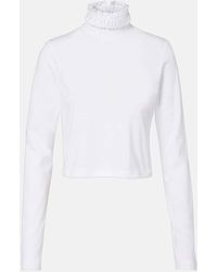 Alaïa - Cropped Turtleneck Cotton Jersey Top - Lyst