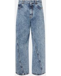 Alaïa - Twisted Low-Rise Wide-Leg Jeans - Lyst
