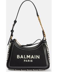 Balmain - B-army monogrammed canvas and smooth leather handbag - Lyst