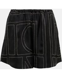 Totême - Shorts de seda con logo - Lyst