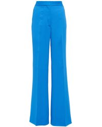 Womens Clothing Trousers Blue - Save 19% Slacks and Chinos Wide-leg and palazzo trousers Stella McCartney Cotton New Flare Rib Trousers in Dark Blue 