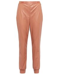 Wolford - High-rise Tapered Faux Leather Pants - Lyst