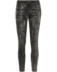 Amiri Skinny-Jeans mit Schlangenleder-Print - Schwarz