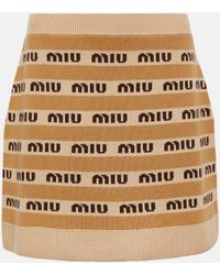 Miu Miu - Mini-jupe en laine vierge a logo - Lyst