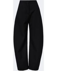 Alaïa - Wool Barrel-Leg Pants - Lyst