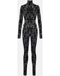 Norma Kamali - Floral Lace Catsuit - Lyst