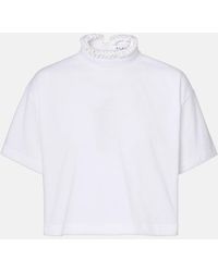 Alaïa - Cropped Cotton Jersey Turtleneck Top - Lyst