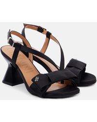Ganni - Sandales À Talon Sablier Noires À Boucle Décorative Surdimensionnée - Lyst