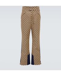 Gucci - Straight-leg Panelled Monogrammed Cotton-blend Canvas Trousers - Lyst
