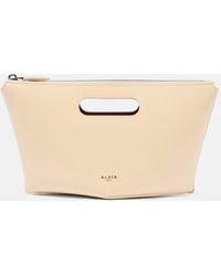 Alaïa - Folded Mini Leather Clutch - Lyst