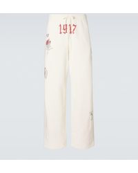 Balenciaga - Printed Cotton Fleece Sweatpants - Lyst