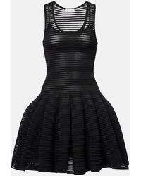 Alaïa - Short Dresses - Lyst