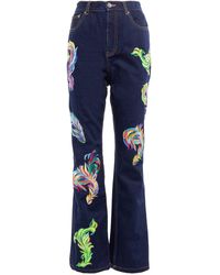 Area - Embroidered Feather Back-slit Jeans - Lyst