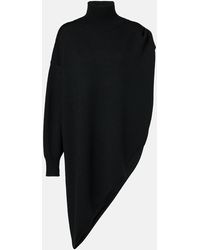 Alaïa - Turtleneck Asymmetric Cape Hybrid Wool Sweater - Lyst