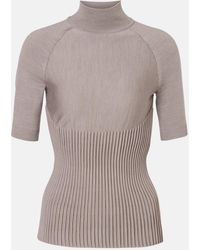 Alaïa - Ribbed-Knit Turtleneck Wool-Blend Top - Lyst