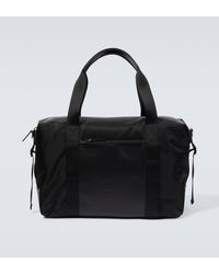 Tod's - Large Leather-trimmed Duffel Bag - Lyst