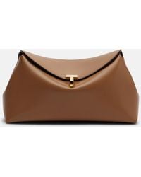 TOTEME - T-Lock Small Leather Clutch - Lyst