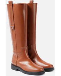 Tod's - Botas con placa del logo - Lyst